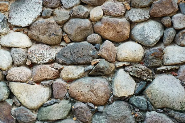 Фрагмент стены из натурального камня — стоковое фото