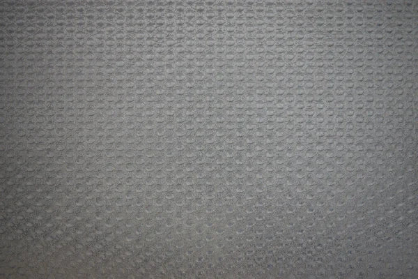 Kabarcıkları ile gri sentetik malzeme — Stok fotoğraf