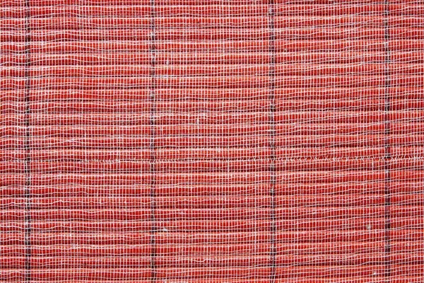 Textuur van een rode stro mat — Stockfoto