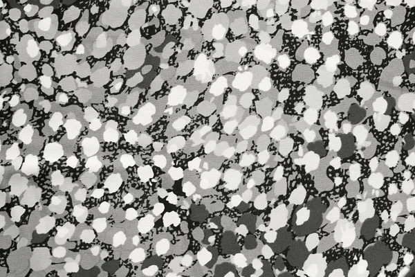 Monochroom abstracte textuur van een vlekkerige oppervlak — Stockfoto