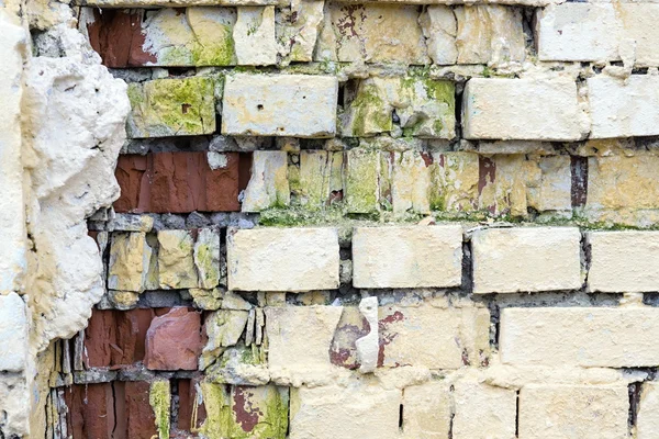 De oude geschilderd en vernietigd bakstenen — Stockfoto