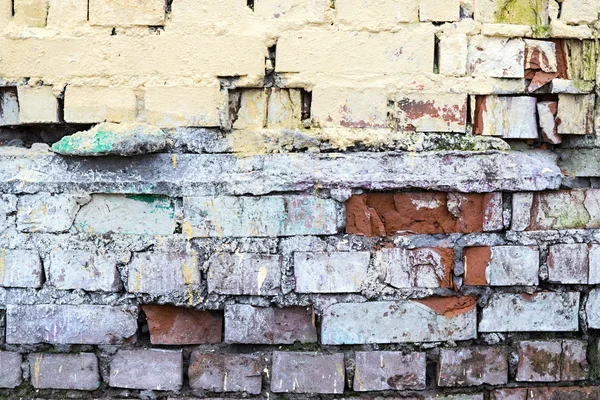 The old painted and destroyed brick walls — Stock Photo, Image