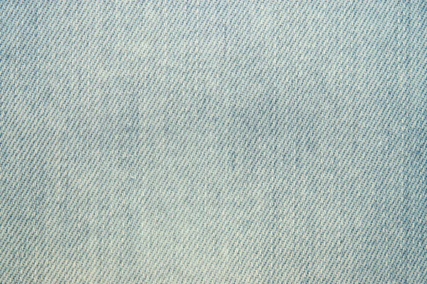 Textura de la tela de jeans descoloridos — Foto de Stock