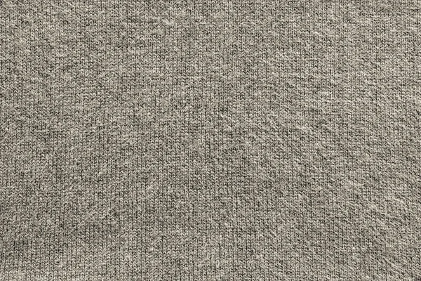 Texture of fleecy knitted fabric gray beige color — Stock Photo, Image