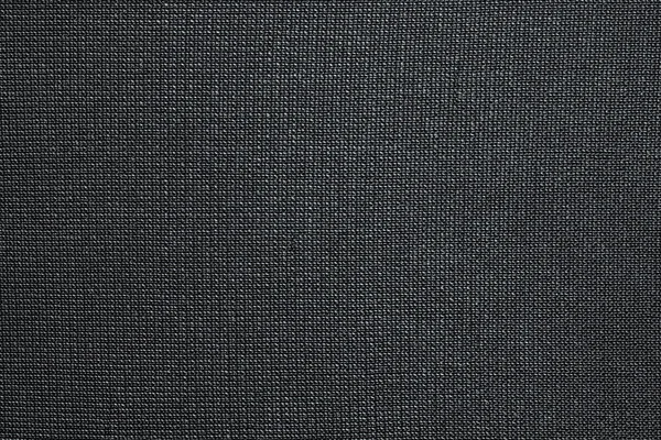 Zwarte achtergrond van textuur synthetisch weefsel — Stockfoto