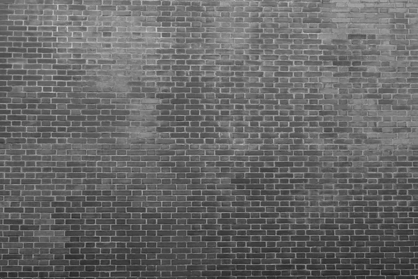 Konsistens av en gammal bricklaying i mörka svart toner — Stockfoto