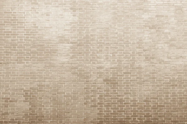 Textura de uma colocação de tijolos em tons bege-claros — Fotografia de Stock