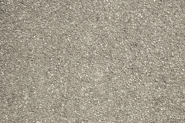 Rough texture of an old asphalt surface — Stock Photo, Image