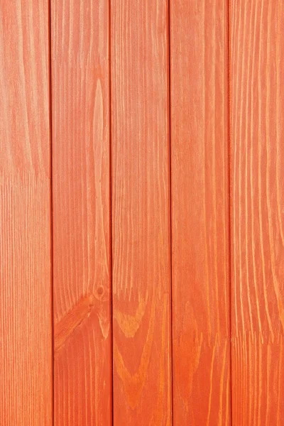 La surface en bois texturée de couleur rouge vif — Photo