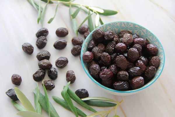 Oily Black Olives Stone — Stock Photo, Image