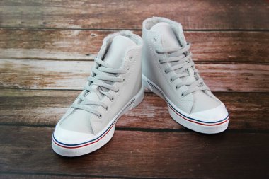 Antalya, Turkey, January 10, 2021. Gray sports sneakers with laces