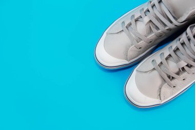 Antalya, Turkey, January 12, 2022. Gray sports sneakers with laces