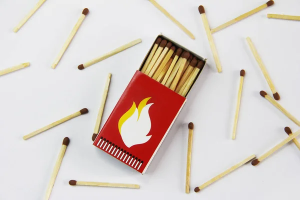 wooden matches for lighting a fire in a paper box