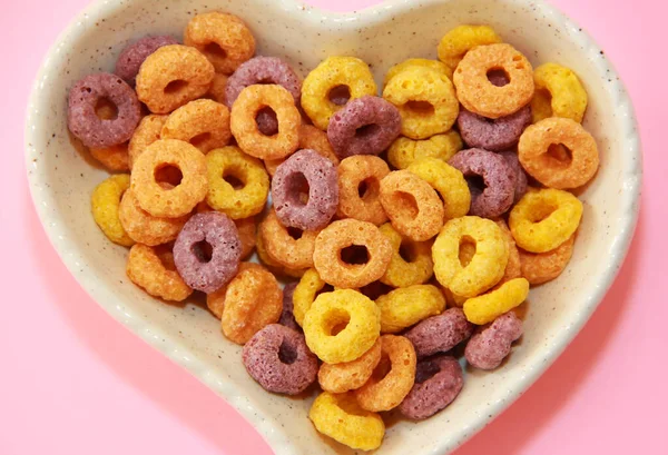 Sweet Multicolored Corn Rings Children Breakfast Heart Shaped Plate Stock Picture