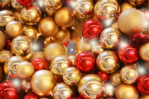 shiny round red and yellow Christmas balls for the new year holiday