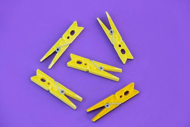 plastic clothespins for fastening clean laundry on a rope