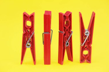 plastic clothespins for fastening clean laundry on a rope