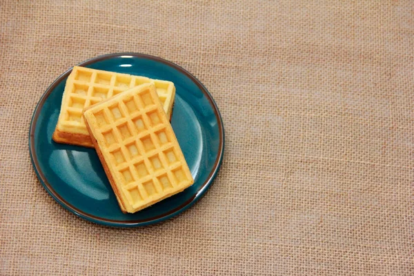 Sweet Baked Fluted Belgian Waffles Blue Ceramic Plate Baggy Background — Stock Photo, Image