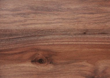 Kahverengi ahşap deseni koyu ve açık çizgili ve damarlı.