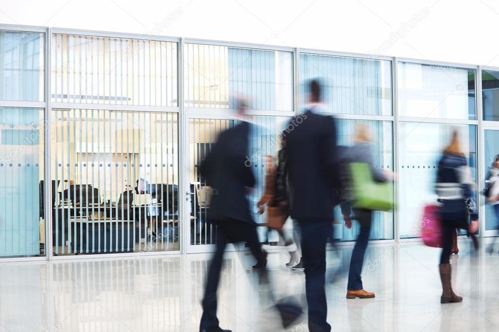 Businesspeople Rushing through Corridor, Motion Blur