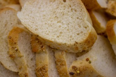 Background of sliced wheat bread pieces
