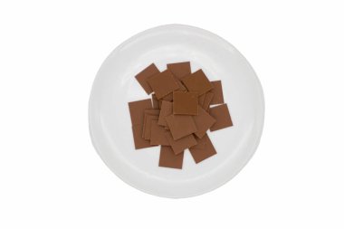 Few bars of milk chocolate on white background
