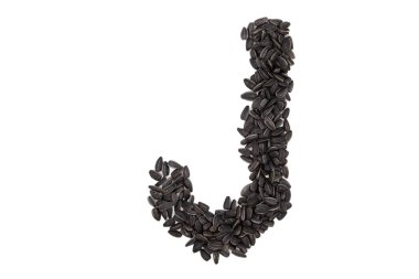 Latin alfabesinin harfleri ayçiçeği tohumlarıyla dizilmiştir. J harfi