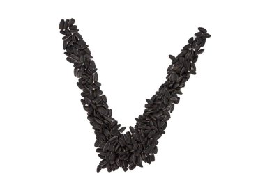 Latin alfabesinin harfleri ayçiçeği tohumlarıyla dizilmiştir. V harfi