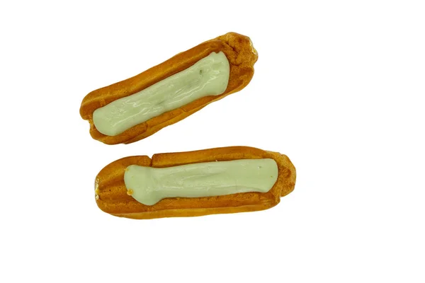 Encantador Delicioso Eclairs Com Enchimento Pistache Fundo Branco — Fotografia de Stock