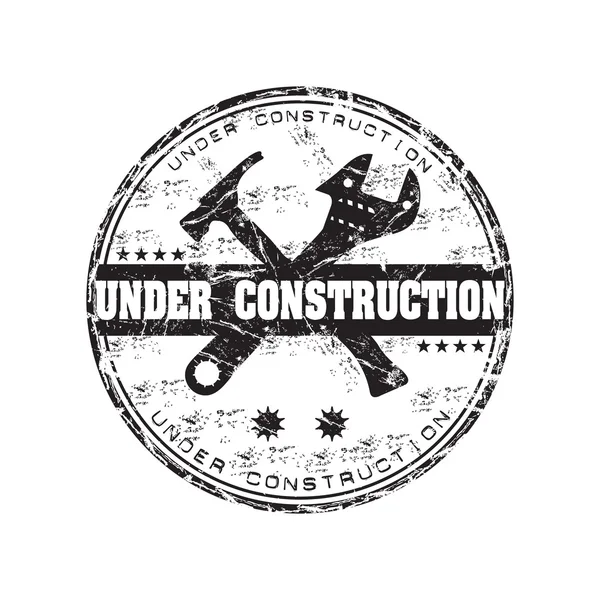 Under construction grunge rubber stamp — Stock Vector