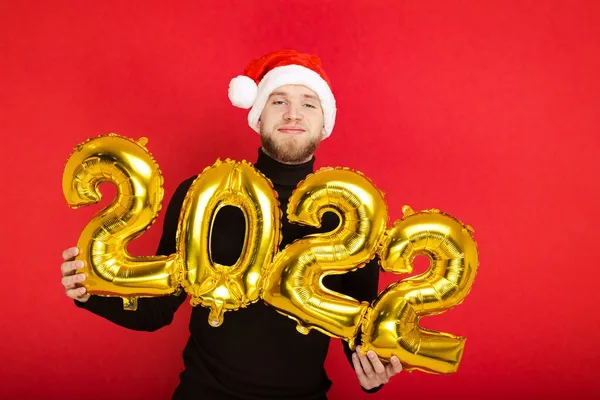 Porträt Eines Mannes Mit Nikolausmütze Und Mit Den Zahlen 2022 — Stockfoto