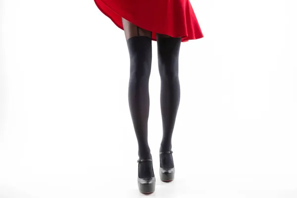 Молодая Женщина Красном Платье Красивые Колготки Черных Туфлях Белом Фоне — стоковое фото