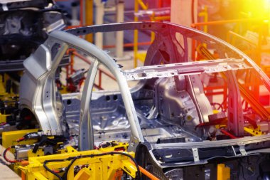 Araba üretim tesisi, robot kaynak hattı.