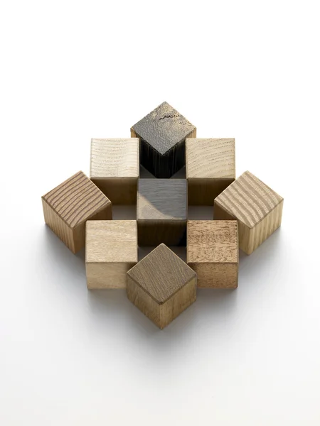 Vários cubos de madeira em um fundo branco — Fotografia de Stock