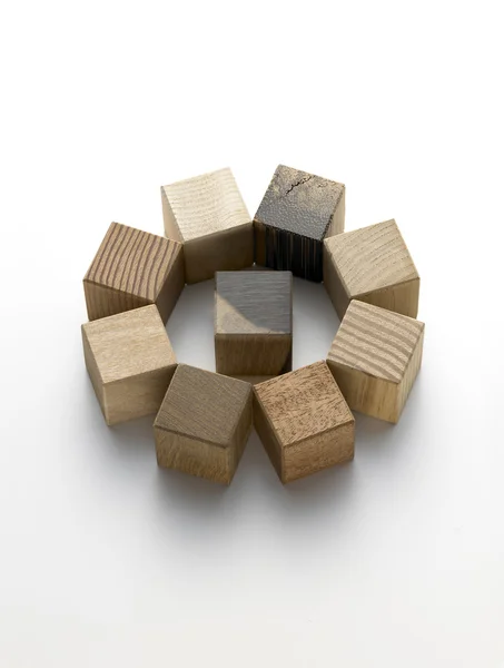 Various wooden cubes on a white background — Stock Photo, Image