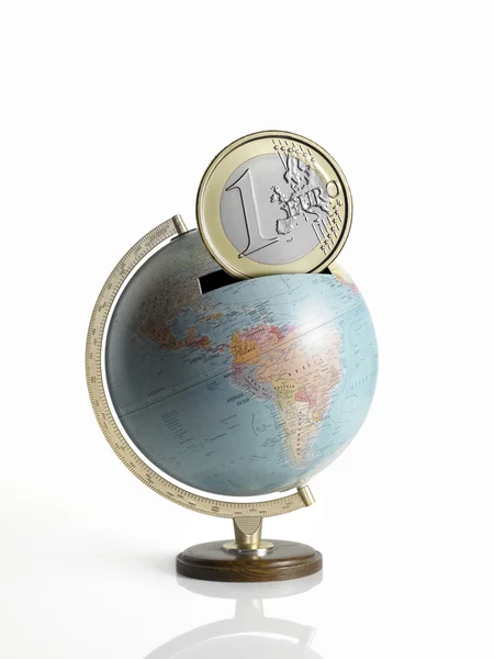 Globe, map of the earth, made as a money box, with euro co — Stock Photo, Image