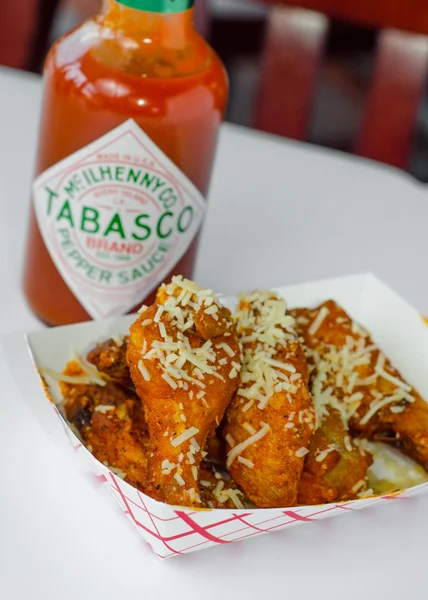 Chicken wings with hot sauce — Stock Photo, Image