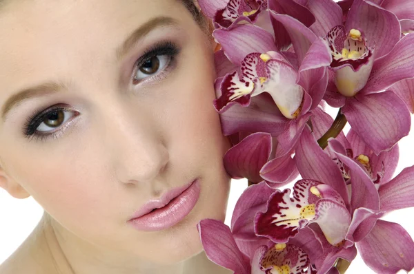 Beauty and orchid — Stock Photo, Image