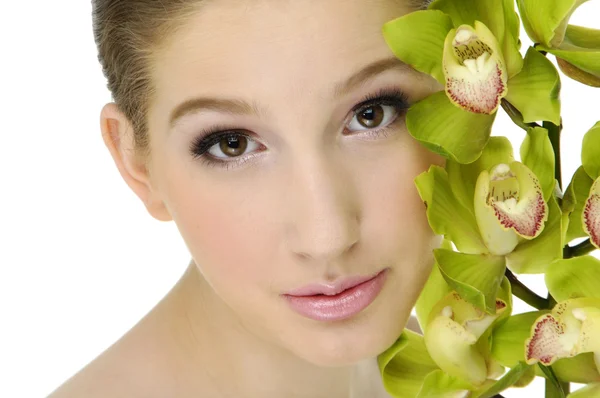 Belleza con orquídea —  Fotos de Stock