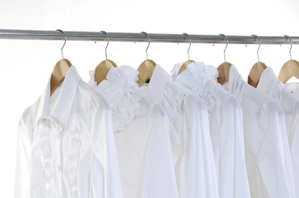 Female clothing on hangers — Stock Photo, Image