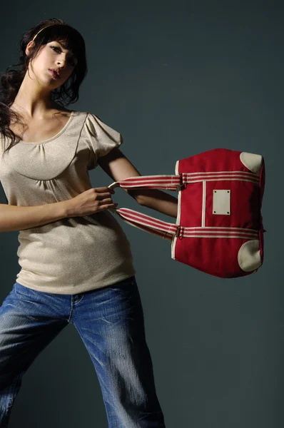 Girl with a bag — Stock Photo, Image