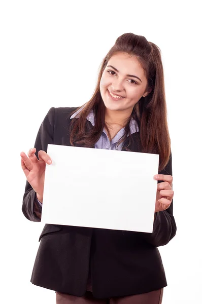 Smiling young girl showing blank — Stock Photo, Image