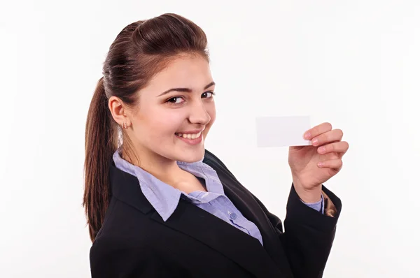 Smiling young girl showing blank — Stock Photo, Image