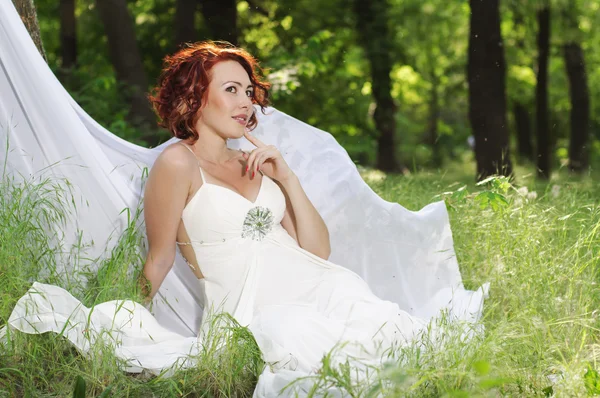 Young pregnant woman in white dress — Stock Photo, Image