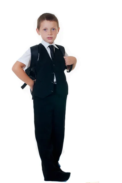 Mały chłopiec z szkolny plecak na białym tle — Zdjęcie stockowe