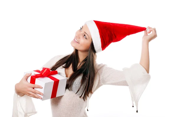 Beautiful young girl with gift in hand — Stock Photo, Image