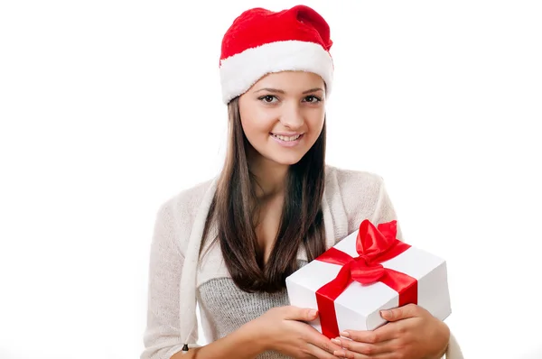 Beautiful young girl with gift in hand — Stock Photo, Image