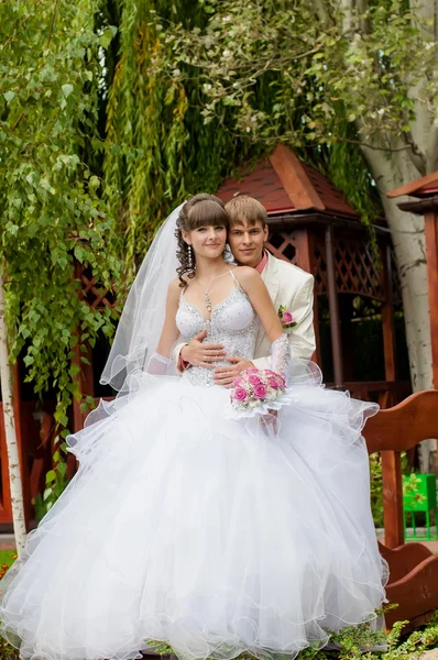 Beautiful bride and groom smilling — Stock Photo, Image