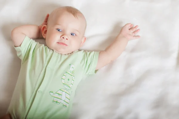Sweet baby on the bed — Stock Photo, Image