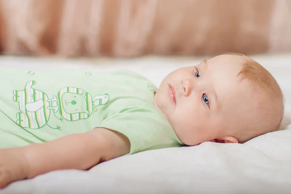 Sweet baby on the bed — Stock Photo, Image